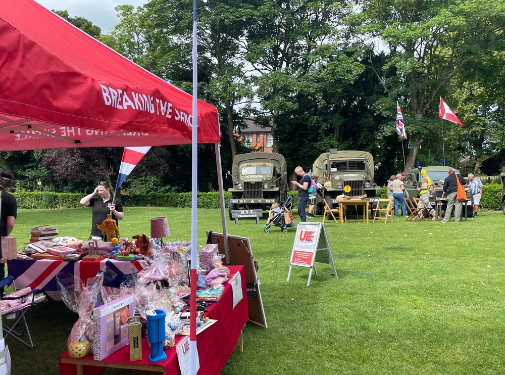 Armed Forces Day 2024: UKVHF gazebo with military equipment in background