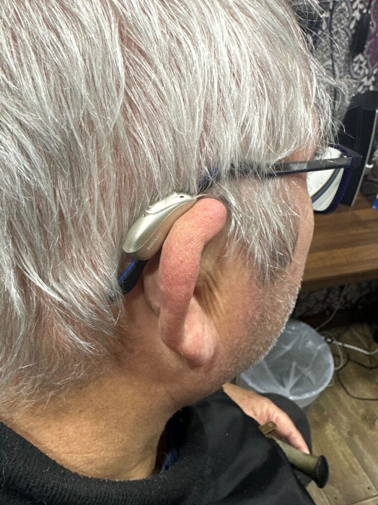 Mr Inott hearing aid photo 2