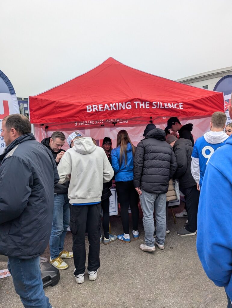 UKVHF booth at BCFC on Remembrance Day: supporters queuing